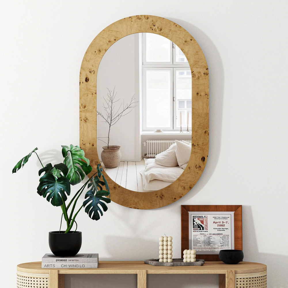 Espejo de pared ovalado con marco de madera elegante