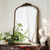 24" x 32" Gold Arched Wall Mirror with Vintage Carving